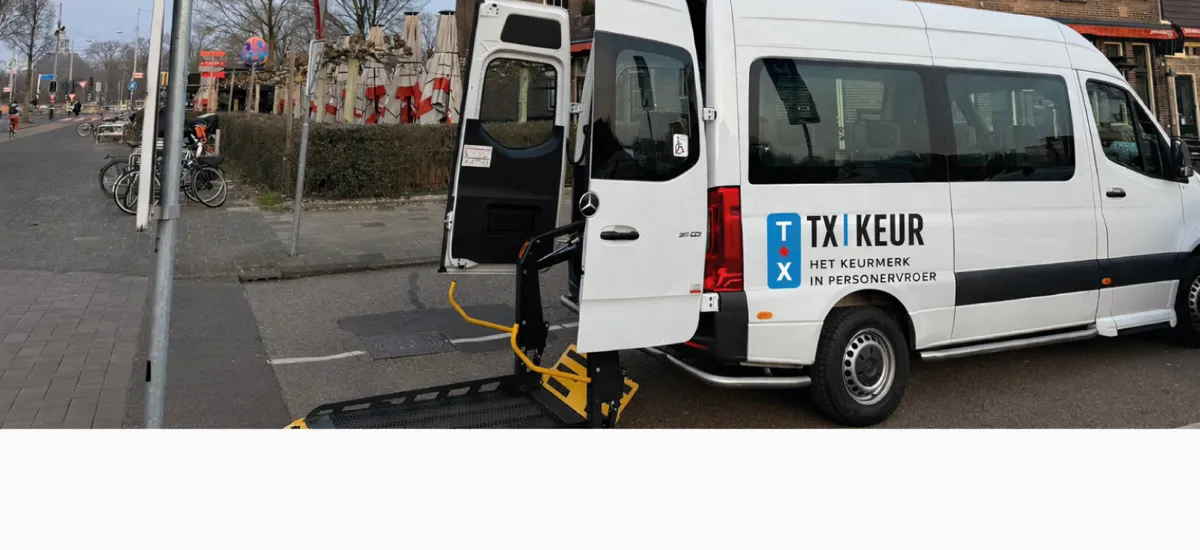Wheelchair-accessible minibus from Rolstoeltaxi Holland with the ramp extended